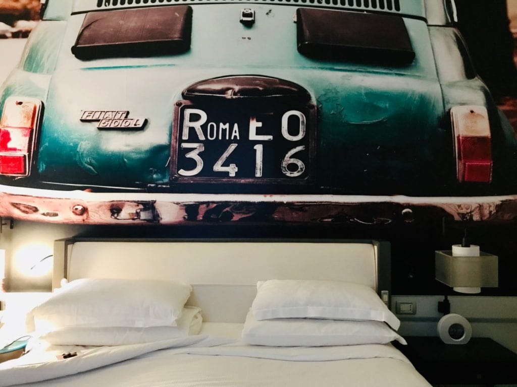 King size bed at Hotel Indigo St George in Rome, Italy