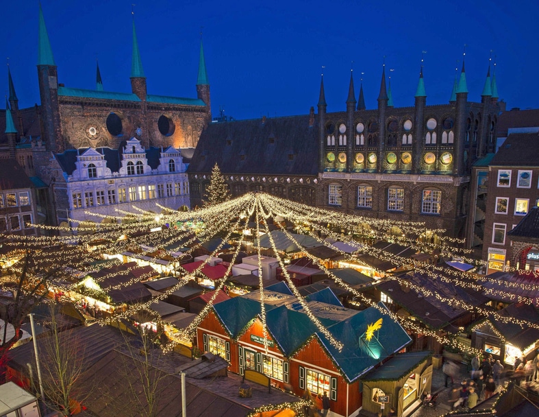 Christmas Market in Lübeck, Germany at the Historic City Hall. 
