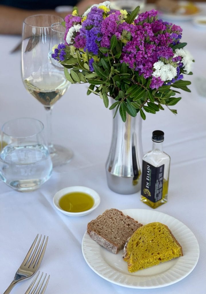 Lunch set up bread olive oil wine Electra Metropolis Athens